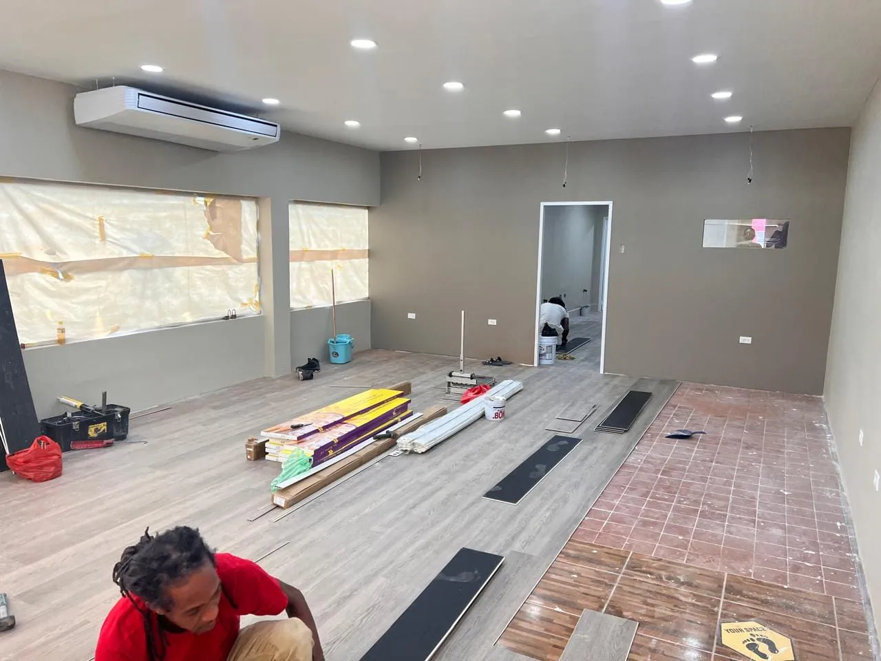 Internal renovation and enhancement works with flooring installation in progress